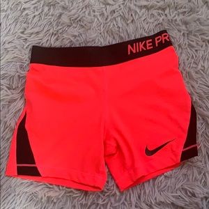 Pink nike pro spandex shorts